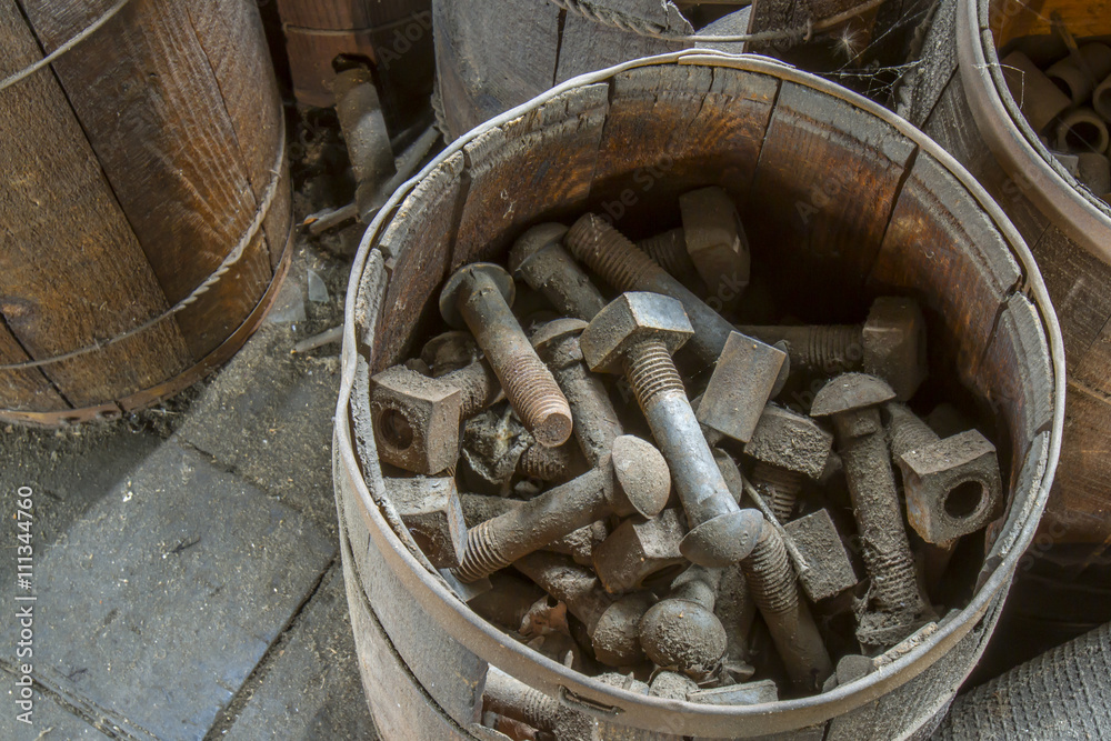 Basket of industrial nuts and bolts Basket of industrial nuts and bolts