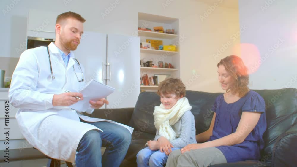 home doctor came to sick boy and his mother. he examines a child and records readings in notebook home doctor came to sick boy and his mother. he examines a child and records readings in notebook