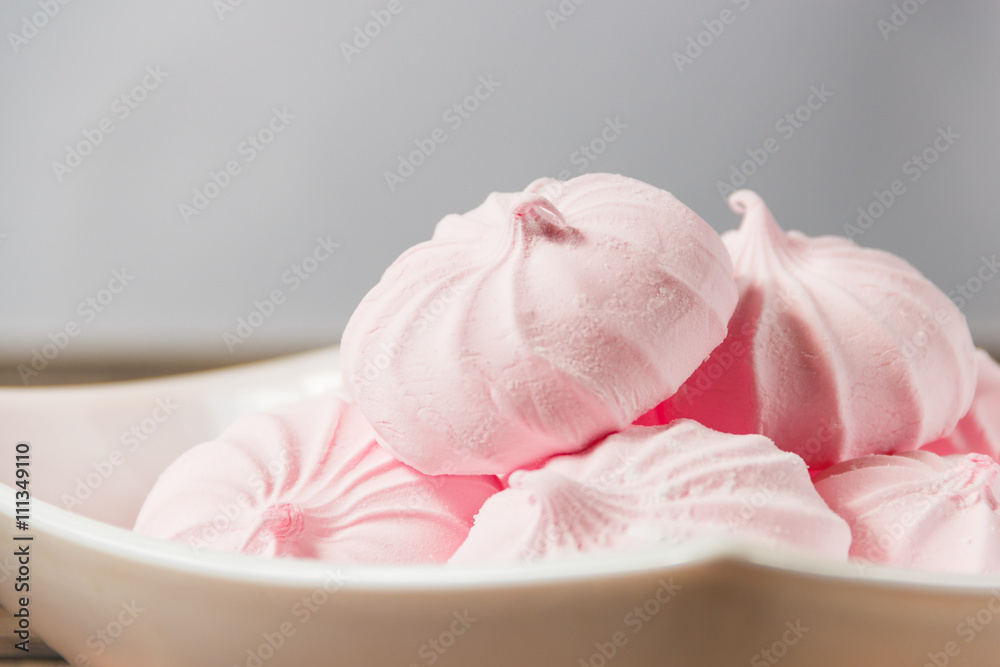 Pink Marshmallows - Zephyr in White Plate. Sweet Dessert Concept Pink Marshmallows - Zephyr in White Plate. Sweet Dessert Concept