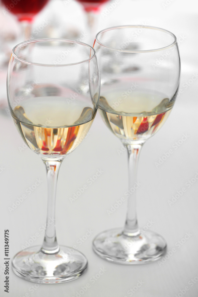 Wine glasses with red and white wine, closeup