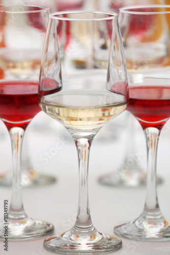 Wine glasses with red and white wine, closeup