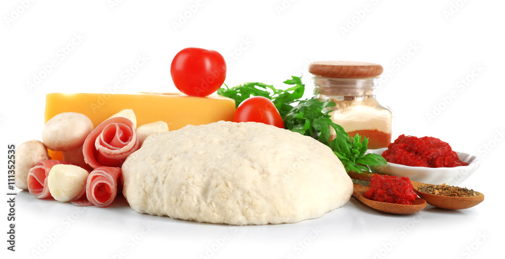 Fresh dough and other different ingredients for pizza isolated on white Fresh dough and other different ingredients for pizza isolated on white