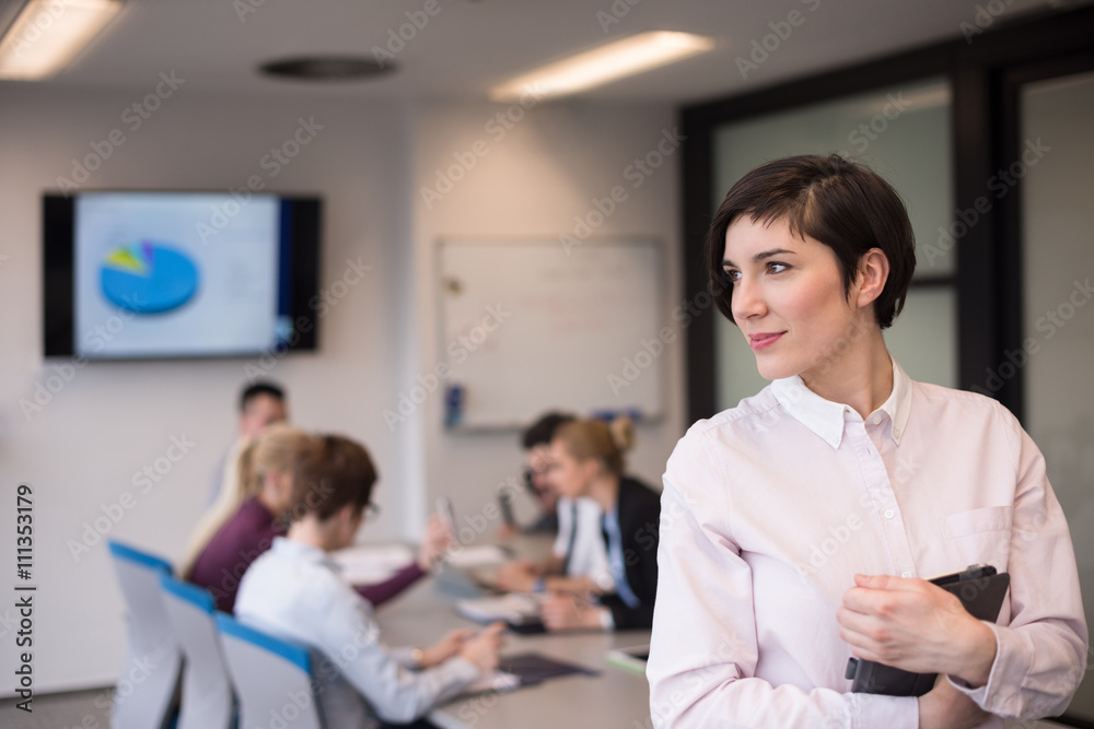 hispanic businesswoman with tablet at meeting room hispanic businesswoman with tablet at meeting room
