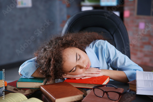 Tired beautiful girl sleepi...