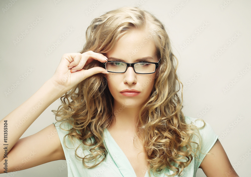 blond woman with glasses
