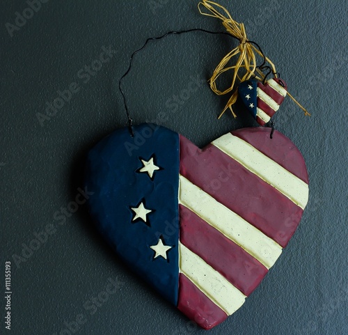 USA flag heart on dark background photo