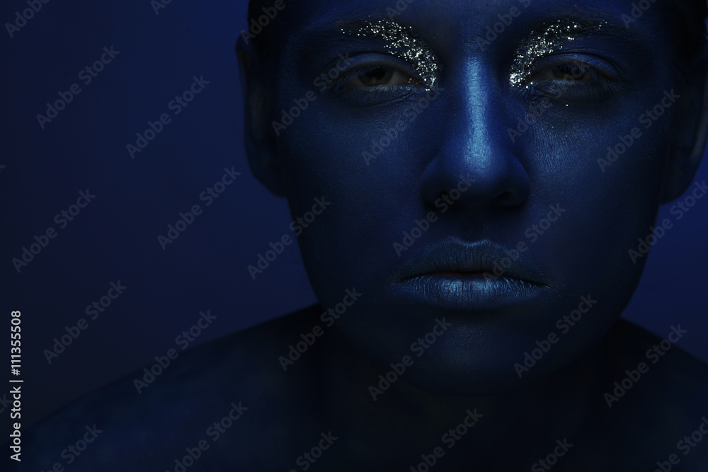 woman with dark blue face woman with dark blue face