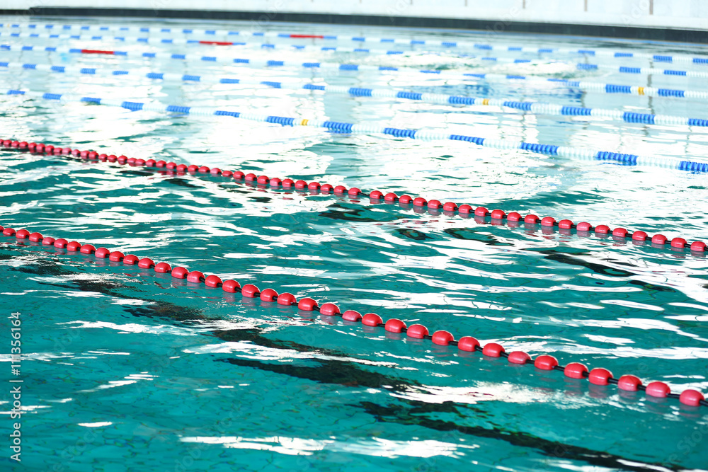 Background of water and markers in the swimming pool
