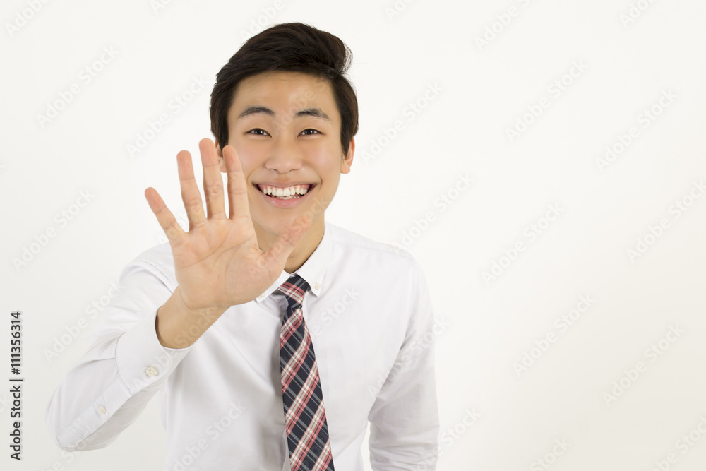 Handsome male manager waving to his colleague Handsome male manager waving to his colleague