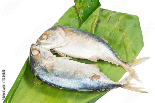 mackerel fish put on banana leaf
