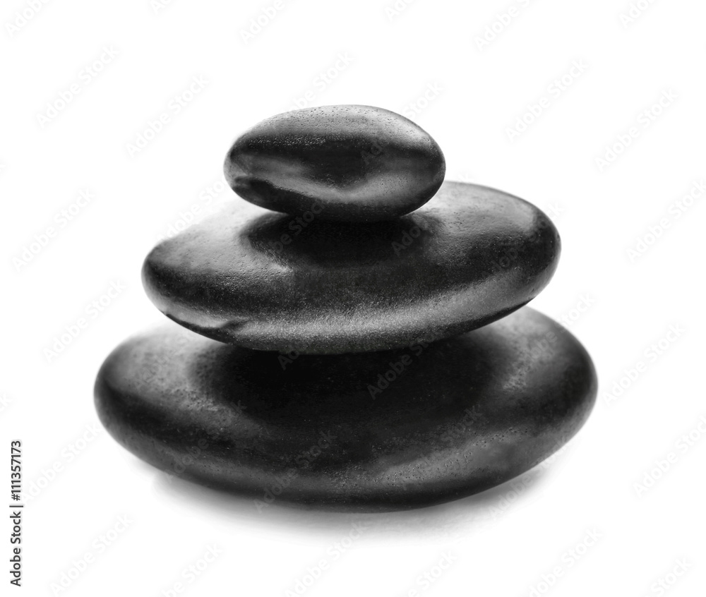 Stack of spa hot stones isolated on white Stack of spa hot stones isolated on white
