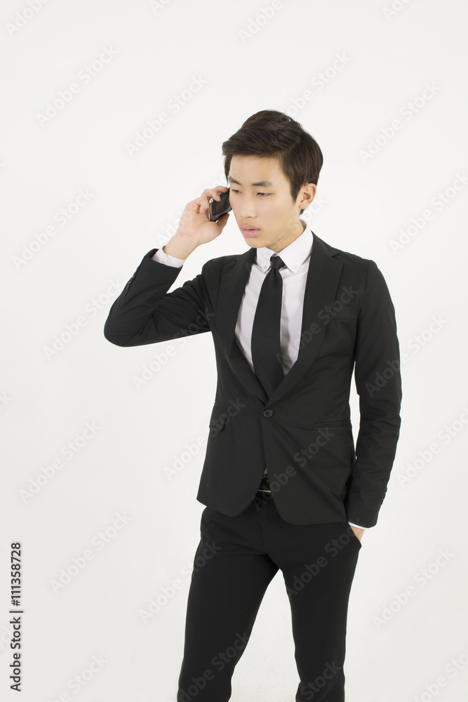 Asian businessman using mobile smart phone Asian businessman using mobile smart phone