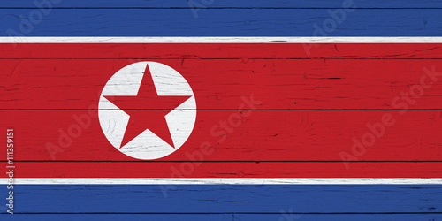 Flag of North Korea on wooden background