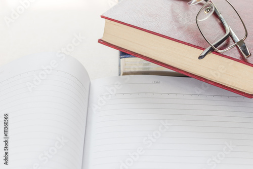 Eyeglasses and Notepad with blank page