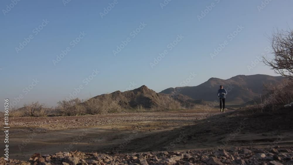 A morning jog on hilly terrain A morning jog on hilly terrain