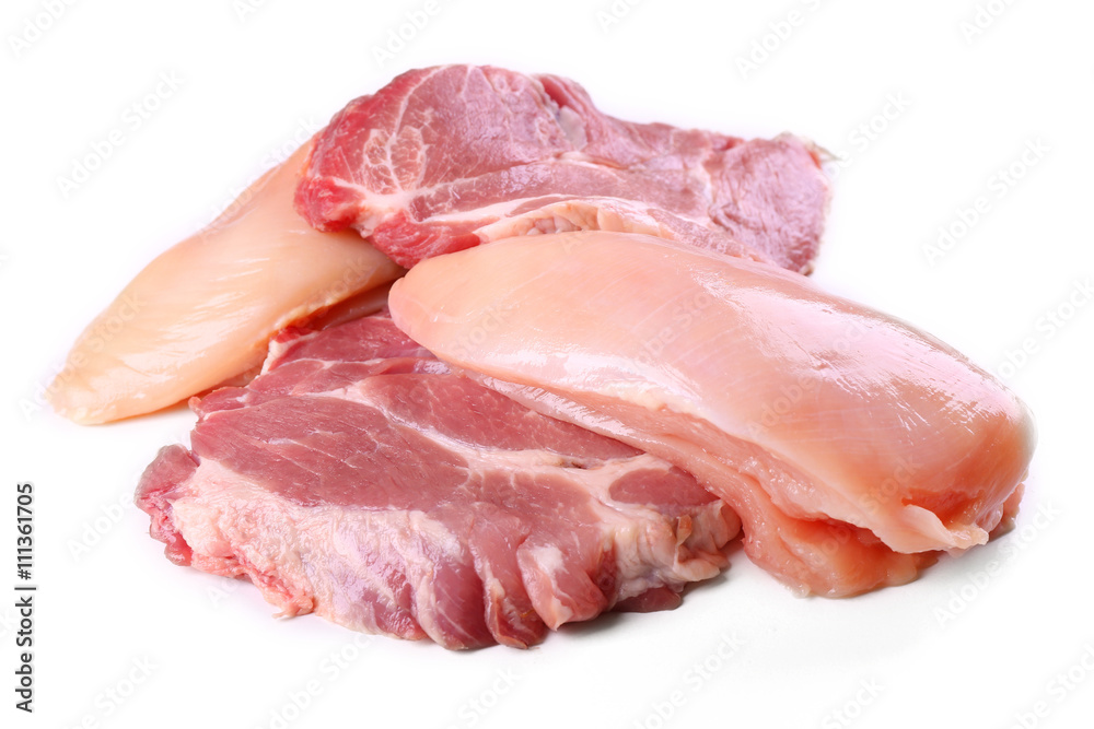 Pieces of pork and chicken meat, isolated on white Pieces of pork and chicken meat, isolated on white