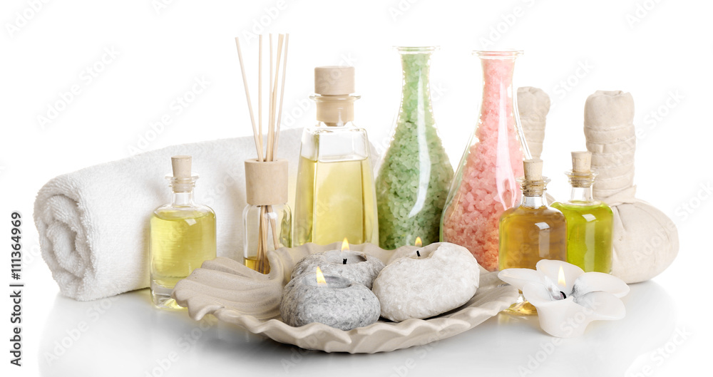 Spa treatment with essential oils isolated on white.