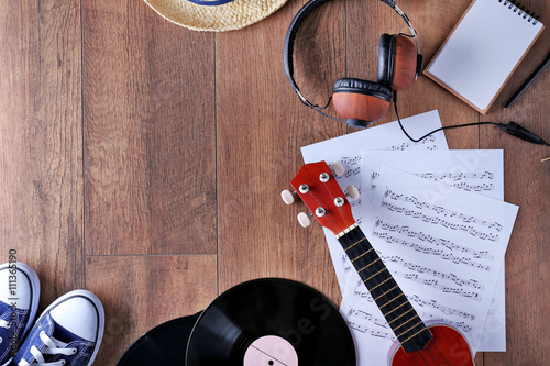 Small guitar, headphones, v...