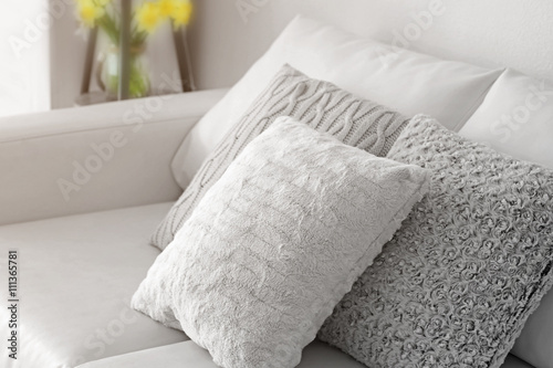Fototapeta Naklejka Na Ścianę i Meble -  Stylish pillows on grey couch