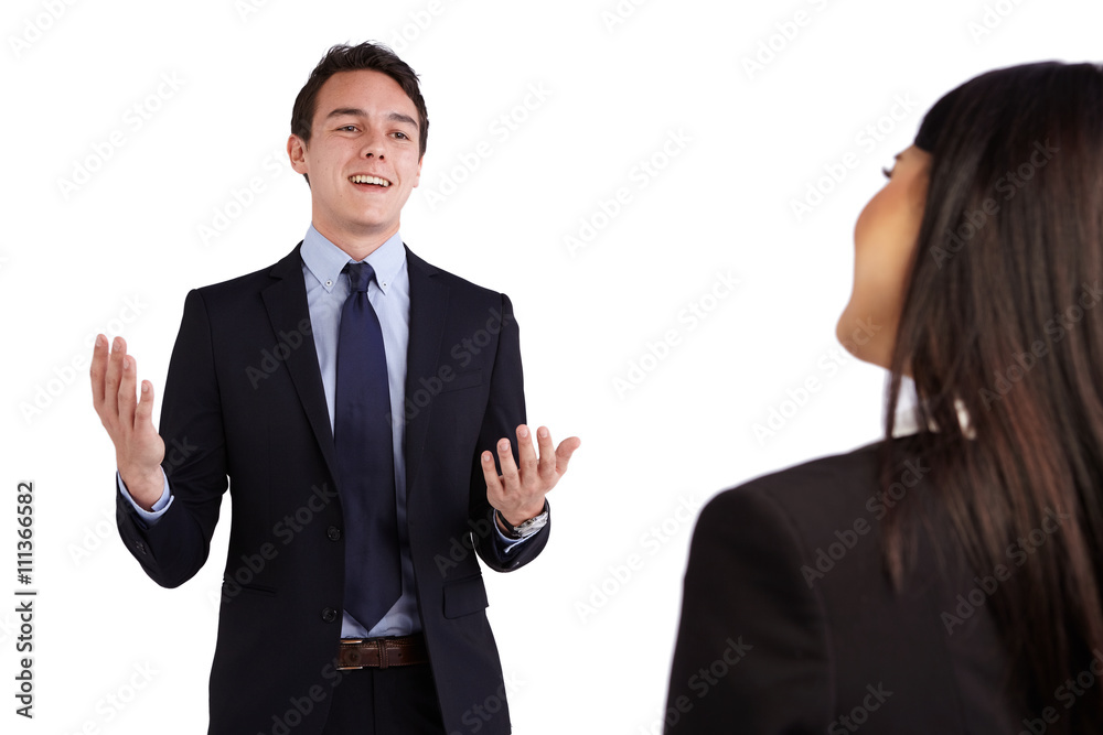 Young Caucasian business man smiling happily to a business woman Young Caucasian business man smiling happily to a business woman