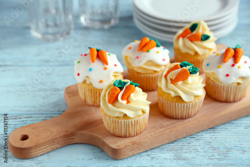 Photography Easter cupcakes on cutting board, closeup