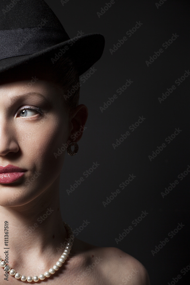 Portrait of a beautiful young model in black hat Portrait of a beautiful young model in black hat