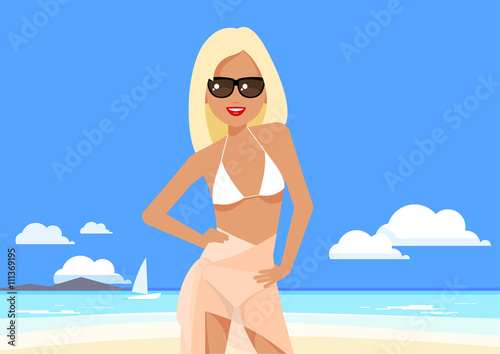 Cute girl in a bikini and pareo on the beach.