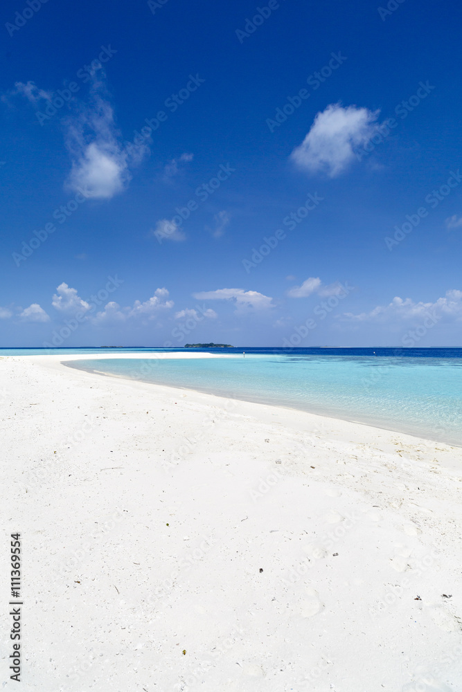 Beautiful island beach with sandspit at Maldives Beautiful island beach with sandspit at Maldives