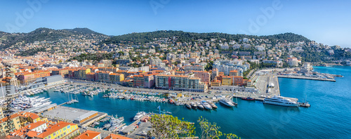 Panoramic view of Nice port and buildings in mountains