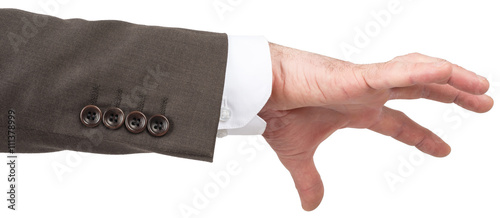 Hand of caucasian male to grab object photo