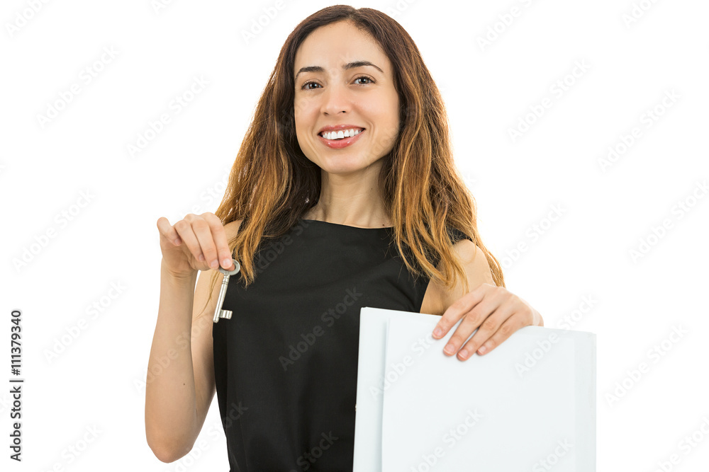 Business woman showing a contract and a key Business woman showing a contract and a key