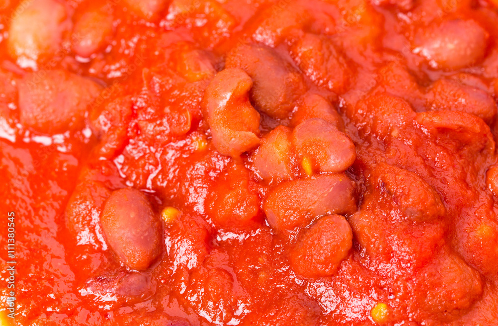 Cooked red beans in sauce closeup. Cooked red beans in sauce closeup.
