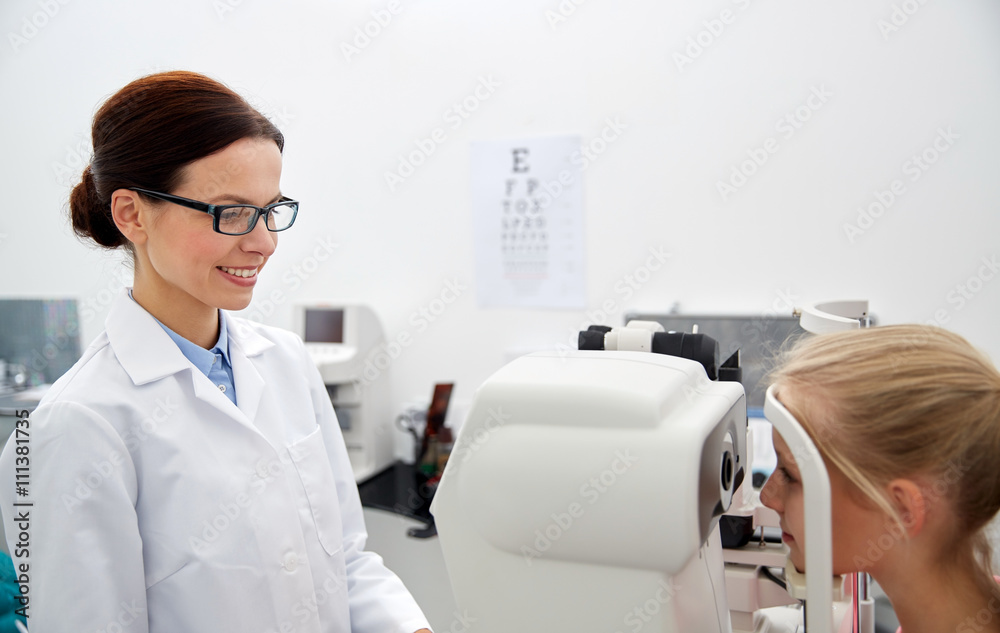 optician with tonometer and patient at eye clinic optician with tonometer and patient at eye clinic