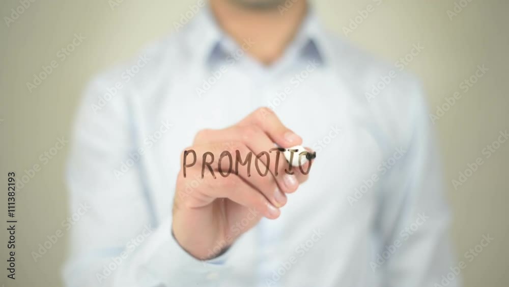 Promotion, Man writing on transparent screen Promotion, Man writing on transparent screen