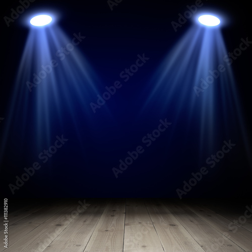 Spotlights on wooden floor in empty room
