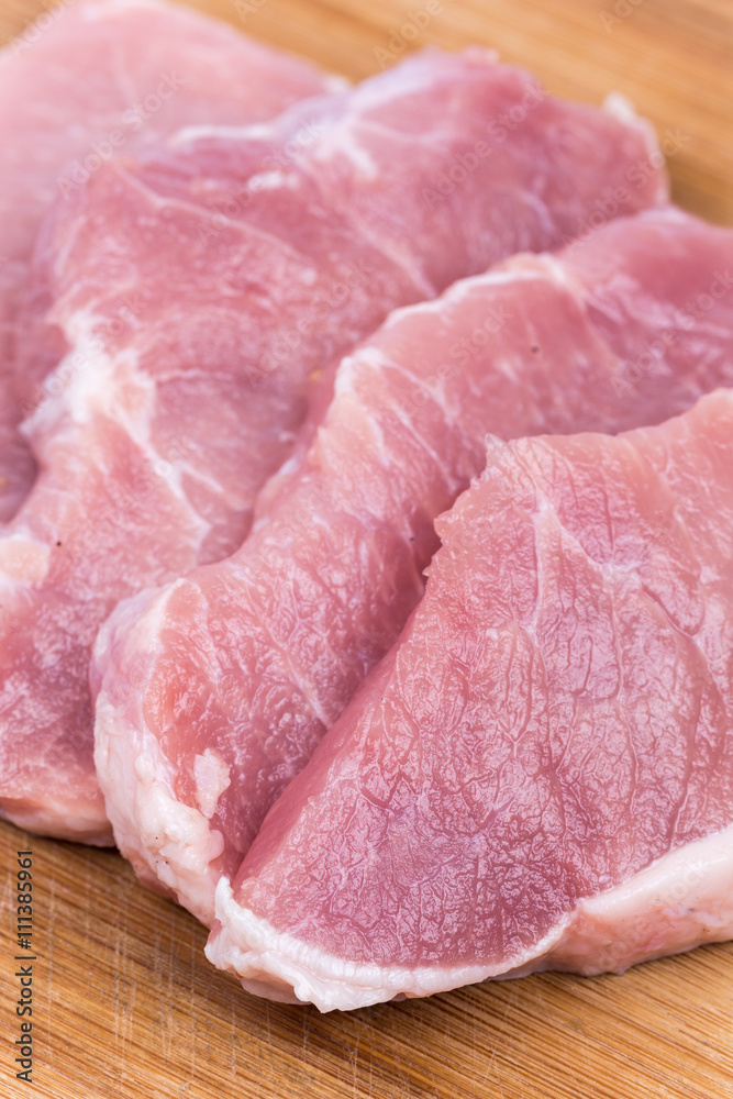 Close up macro raw pork chops Close up macro raw pork chops