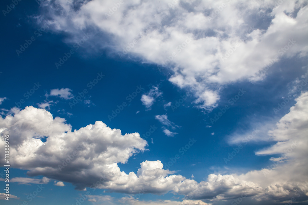 Obraz premium white clouds in the blue sky. background
