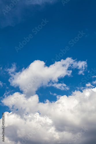 white clouds in the blue sky. background