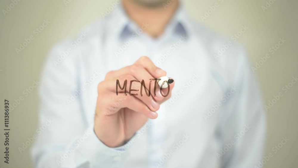 Mentor, Man writing on transparent screen Mentor, Man writing on transparent screen