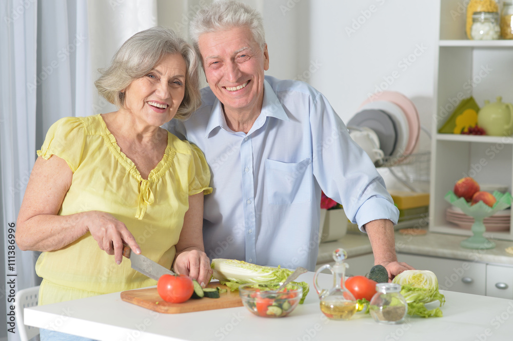 senior man and woman  in the kitchen