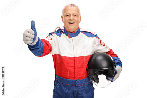 Mature car racer giving a thumb up
