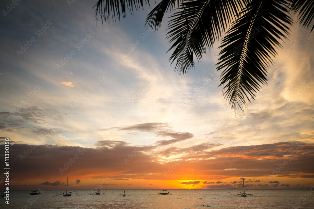 idyllic tropical beach with sunset