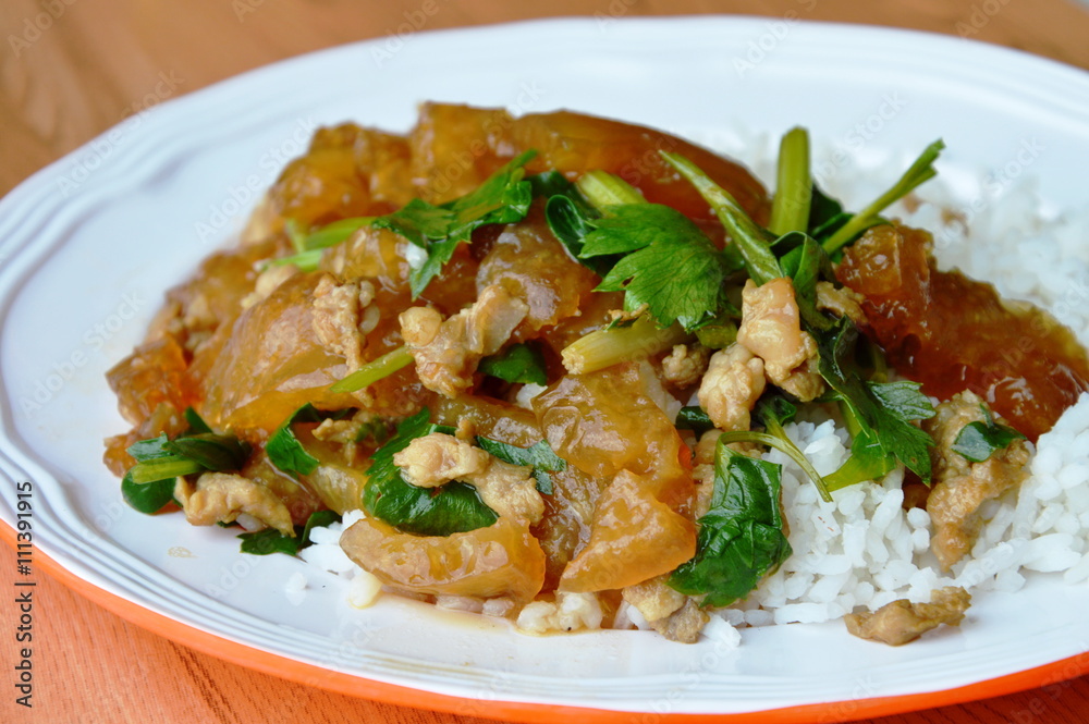 stir fried pork skin with Chinese celery on plain rice