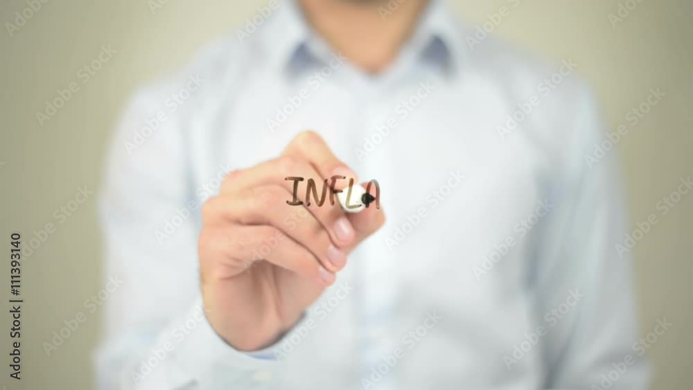 Inflation, Man writing on transparent screen Inflation, Man writing on transparent screen