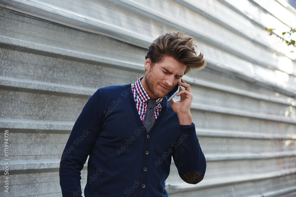 Young businessman talking smartphone phone Young businessman talking smartphone phone