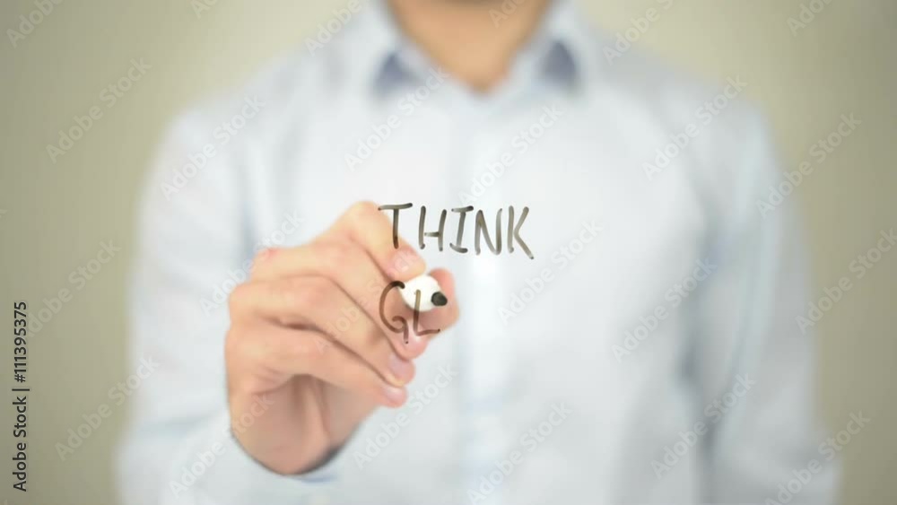 Think Global, Man writing on transparent screen Think Global, Man writing on transparent screen