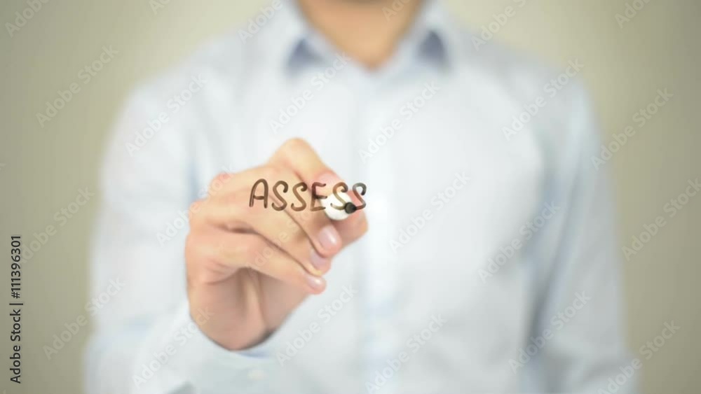 Assessment,  Man writing on transparent screen
