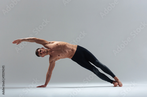Fitness man doing stretching exercise