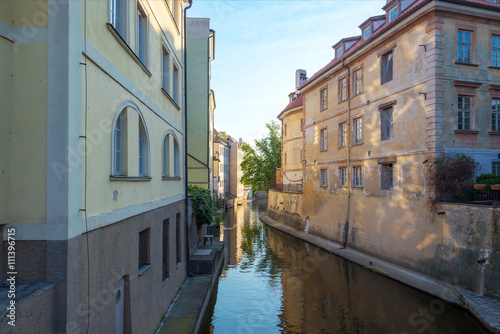 view of the narrow channel among houses in Prague © Ekaterina Elagina