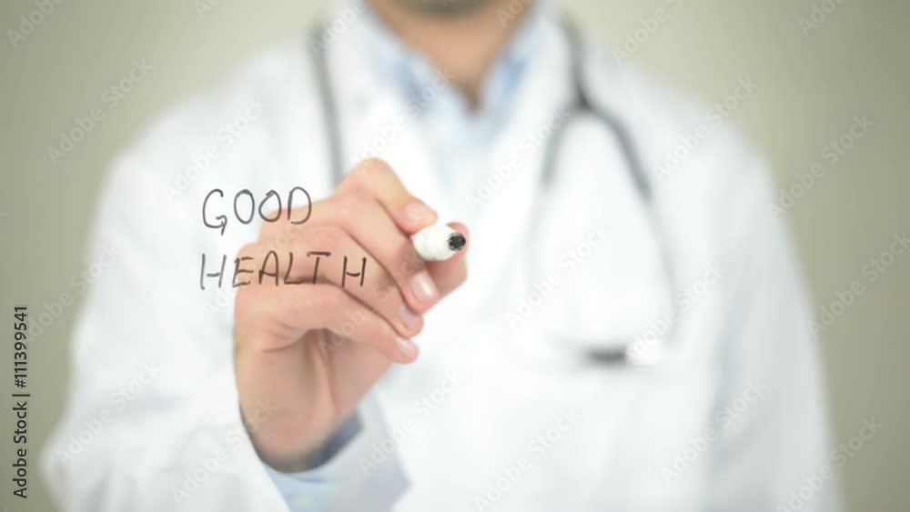Good Health, Good Life, Doctor writing on transparent screen Good Health, Good Life, Doctor writing on transparent screen